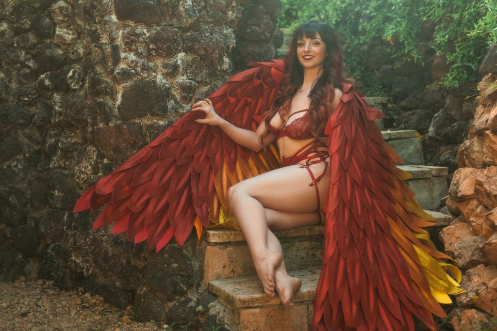 Feature entertainer Phoenix Phires shows off her wings